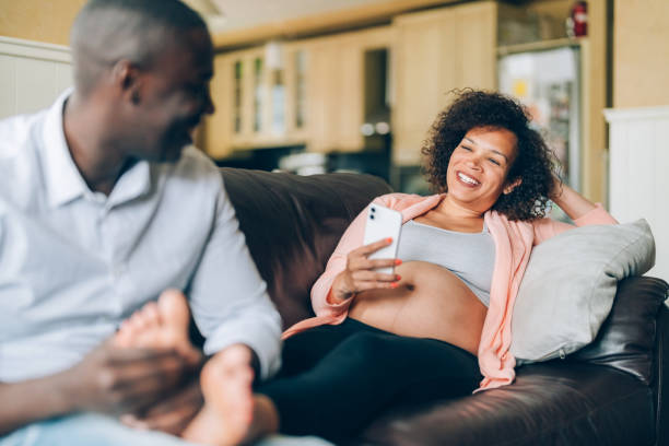 istock Husband massaging his wife's feet 1396511579
