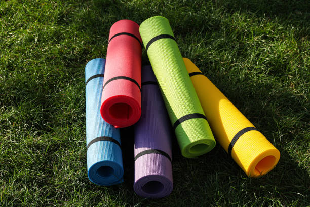 istock Bright exercise  mats on fresh green grass outdoors 1396513242