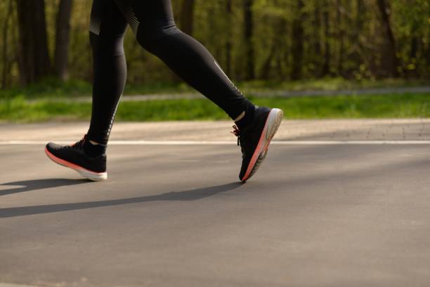 istock Legs of a running man. 1396514634