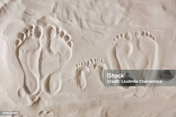 Family Footprints On Sandy Beach Top View Stock Photo - Download Image Now - Footprint, Sand, Family