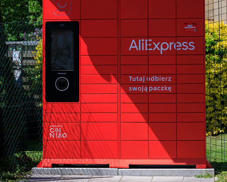 Poznan, Poland. May 10, 2022: Aliexpress close -up automatic self-service delivery locker with parcels form China.