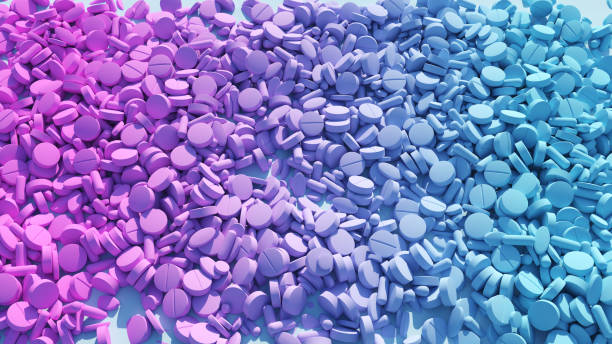 pink blue transgender medicação saúde cuidado abstrato testosterona estrogênio pílulas ética médica - pill multi colored medicine healthcare and medicine - fotografias e filmes do acervo