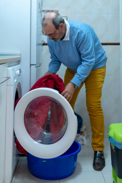 istock housework of retired elderly man. LGTBIQ+ 1396521663