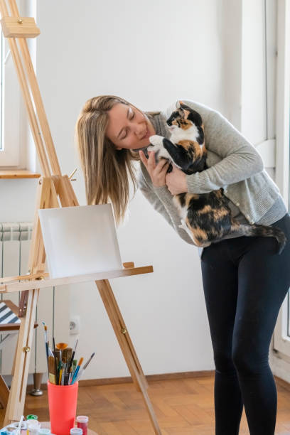 istock Female Artist Working at home 1396522812