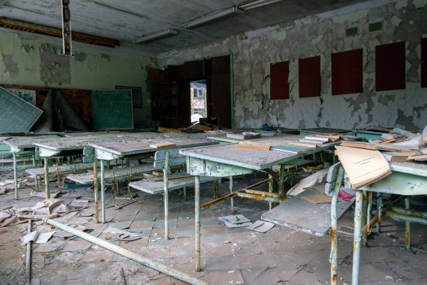 Abandoned Classroom Abandoned Classroom in Pripyat, Chernobyl, Ukraine pripyat city photos stock pictures, royalty-free photos & images
