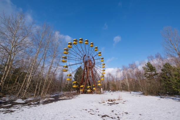 Abandoned Ferris Wheel Abandoned Ferris Wheel in Pripyat, Chernobyl, Ukraine. pripyat city stock pictures, royalty-free photos & images