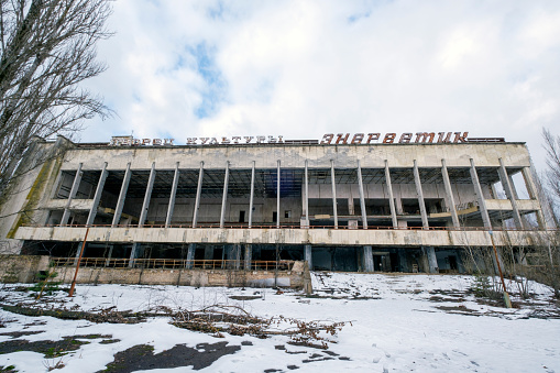 Territory of abandoned industrial area waiting for demolition. Broken and burnt buildings. Former Voronezh excavator factory.