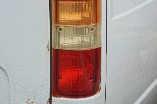istock one red yellow long glass headlight 1396524666