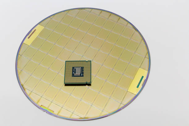 istock Photo of a Computer Chip CPU put on silicon wafer with microchip 1396526655