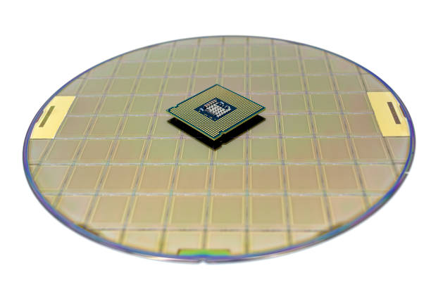 istock Photo of a Computer Chip CPU put on silicon wafer with microchip 1396526758