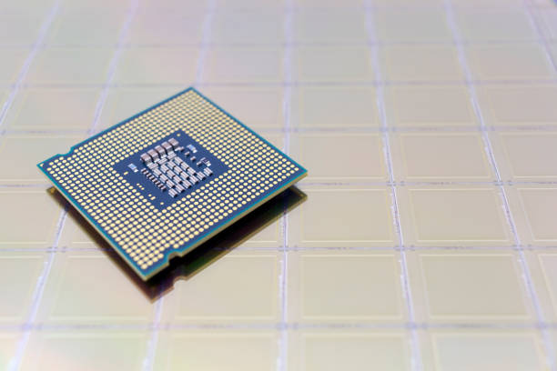 istock Photo of a Computer Chip CPU put on silicon wafer with microchip 1396527695