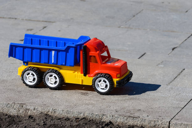 istock Children's Plastic Multi-colored Toy Dump Truck 1396530552