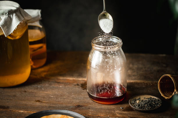 istock Preparing homemade fermented kombucha tea 1396531613