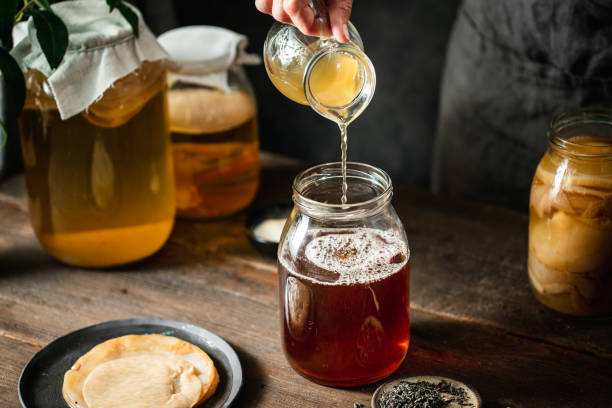istock Woman preparing kombucha at home 1396531631