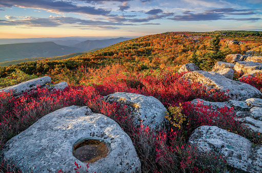 Morning light spills out across an autumn landscape view of Bear Rocks in the Dolly Sods Wilderness area of West Virginia