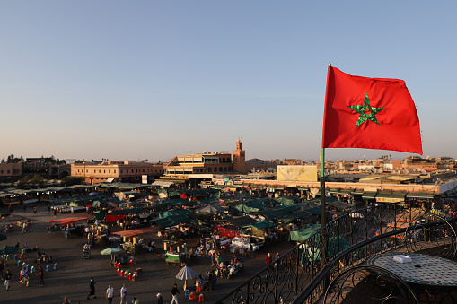 Marrakesh, Morocco - October 29, 2021: People in Jemaa el-Fnaa where main square of Marrakesh, used by locals and tourists