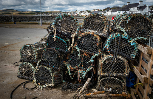 Stack of lobster traps in scotland uk