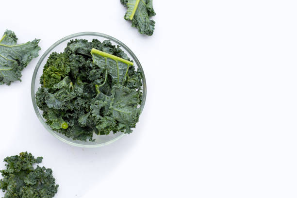 istock Kale leaves on white background. 1396541080