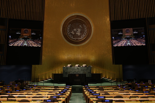 Empty hall of the United Nations General Assembly at the UN headquarters in New York during the Assembly's 76th regular session on February 2, 2022. The chamber has frequently been found empty during the COVID-19 pandemic period due to meeting restrictions imposed by the Host Government.
