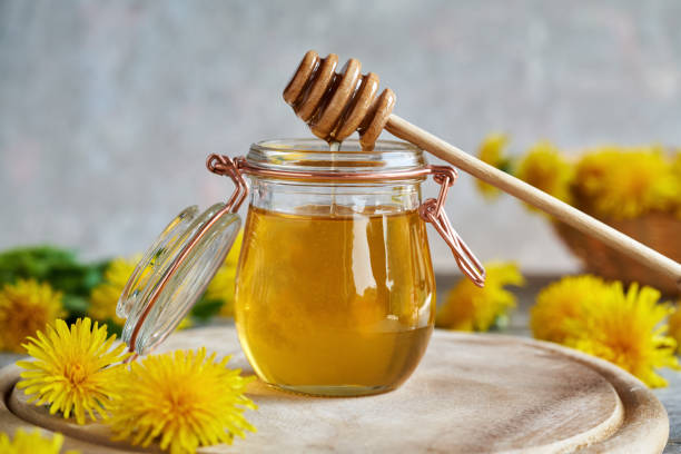 istock Dandelion honey - syrup made from fresh dandelion flowers 1396548882