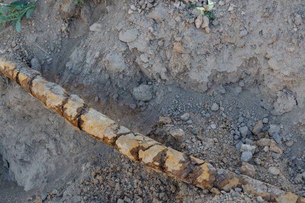 istock Old earth cable, signs of corrosion. Telecommunications cable. Top view. 1396552009