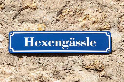 street sign Hexengässle - engl: Witch road - in Hochheim, Germany