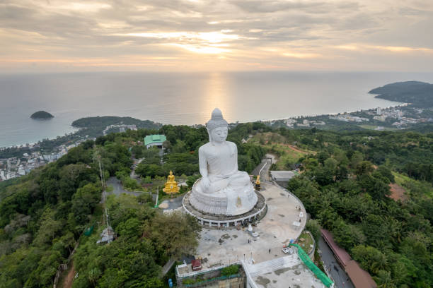 istock Big buddha Phuket Aerial view Cloudy Sunseet Thailand 1396560319