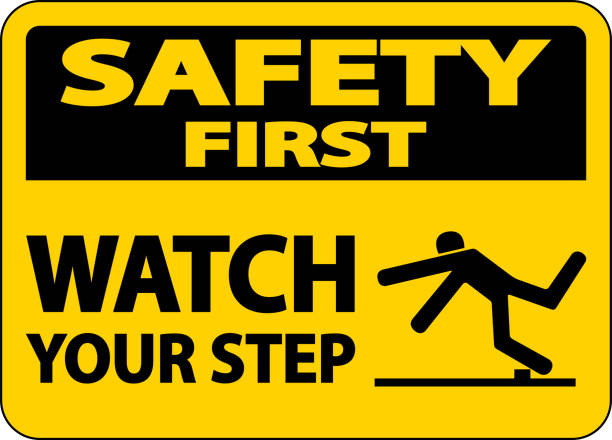 Safety First Watch Your Step Sign On White Background Safety First Watch Your Step Sign On White Background safety first stock illustrations