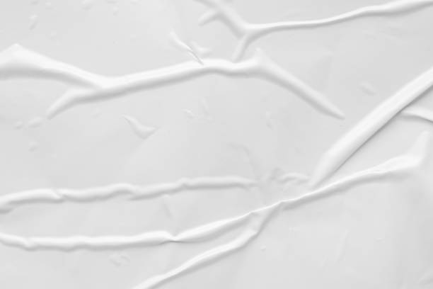 istock white crumpled and creased plastic poster texture background 1396570488