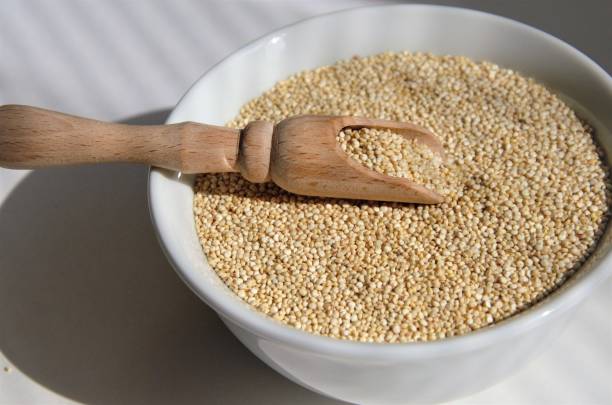 istock Quinoa seed for healthy eating in a white plate with a spoon 1396570629