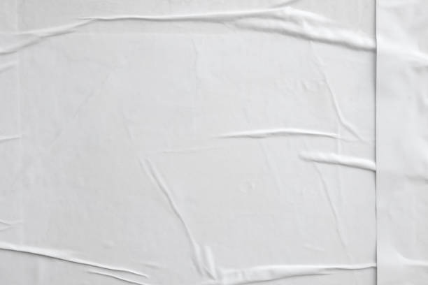 istock white crumpled and creased paper poster texture background 1396570850