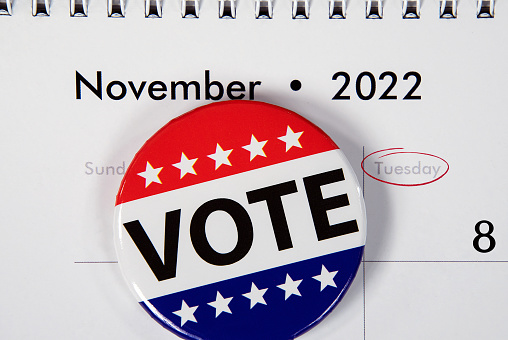 Flag vote pin on November 2022 calendar date for mid-term election event
