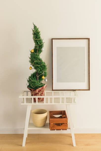 istock Indoor cypress or thuja in pot is decorating balls like Christmas tree. Alternative trees for christmas . Copy space and space for advertising 1396574112