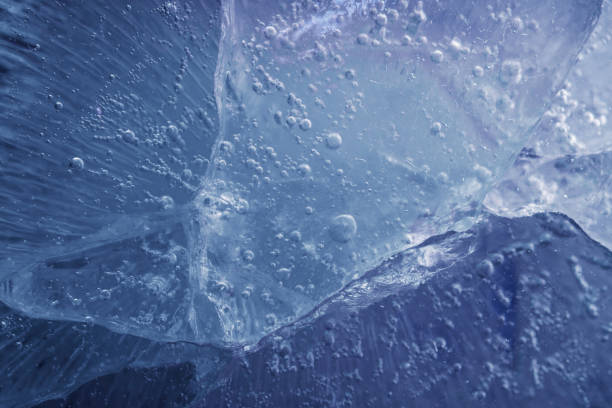 istock beautiful blue ice with cracks. frosty background 1396574582