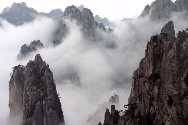 Mount Huang with Fog Mountain Huang is a most famous mountain in China. anhui province stock pictures, royalty-free photos & images