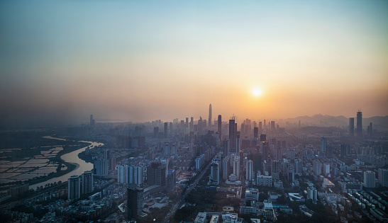 Cityscape of office buildings in Shenzhen's financial area Futian District at sunset, China