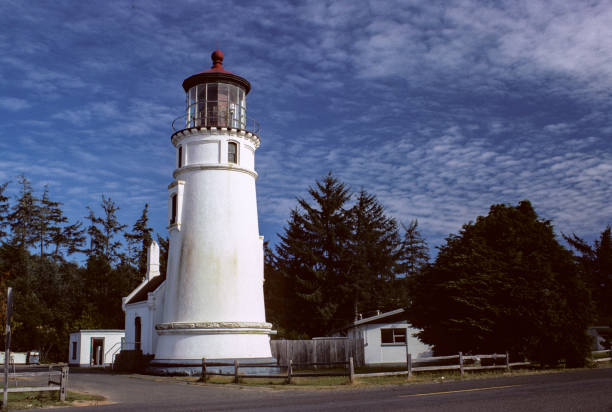 Mendocino County, California, USA - June 2, 2025: Light shines through the fresnel lens of historic Point Cabrillo Light Station at Point Cabrillo Light Station State Historic Park on the Northern California coast.