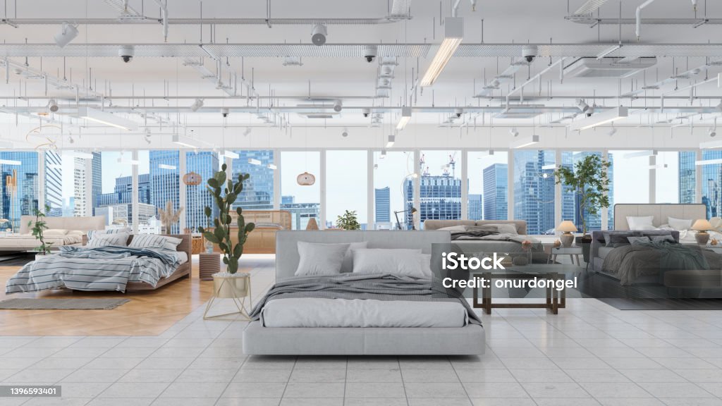 Furniture Showroom With Different Bed Furnitures, Potted Plants And Side Tables. Cityscape From The Window. Mattress Stock Photo