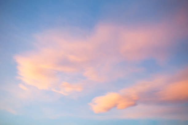 Sky with pink clouds at the sunset.