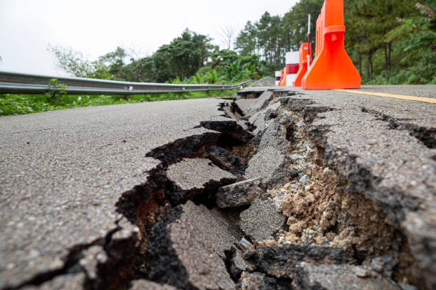 istock Cracked road after the earthquake, non-standard construction. 1396597481