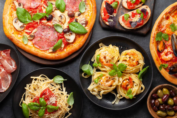 istock Italian cuisine. Pizza, pasta and toasts 1396601070