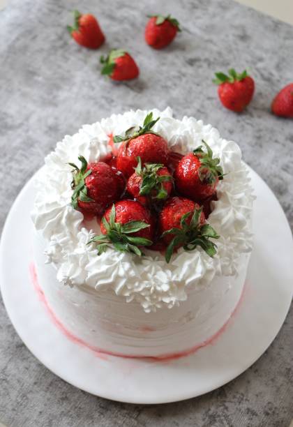 istock Strawberry short cake on a white plate. 1396604071