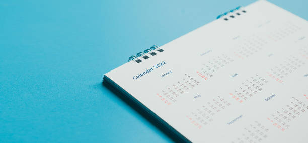 istock Close top view on white calendar 2022 month schedule Work planning and life concept. 1396604444