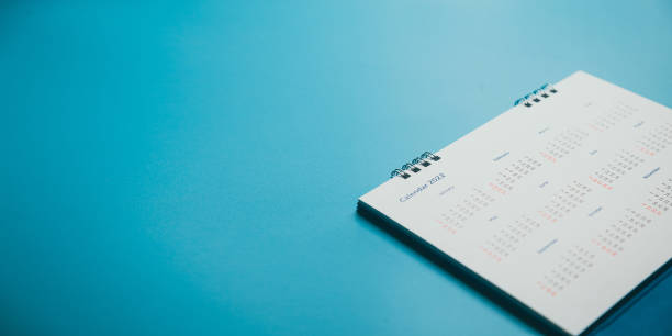 istock Close top view on white calendar 2022 month schedule Work planning and life concept. 1396604445