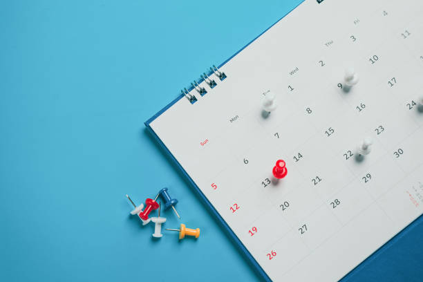 istock Close top view on white calendar 2022 month schedule Work planning and life concept. 1396604456