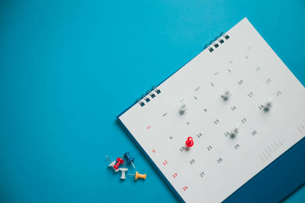 istock Close top view on white calendar 2022 month schedule Work planning and life concept. 1396604458
