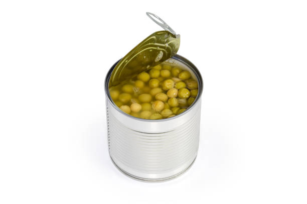 istock Canned green peas in the open round tin can 1396607253