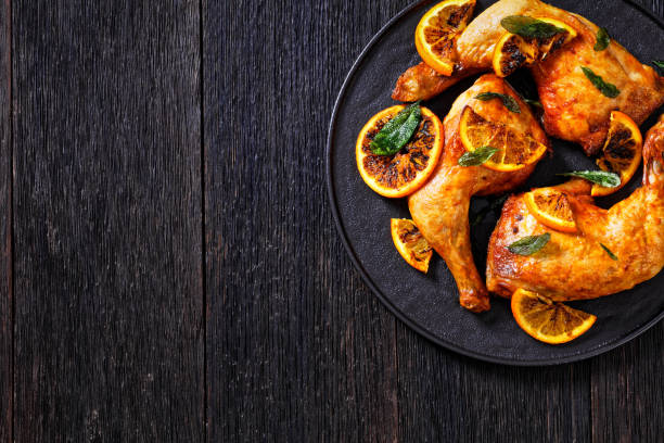 istock Grilled Orange roast Chicken legs with sage 1396607704