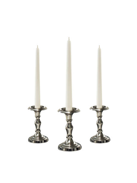 istock Candle on candlestick isolated on white background 1396608506
