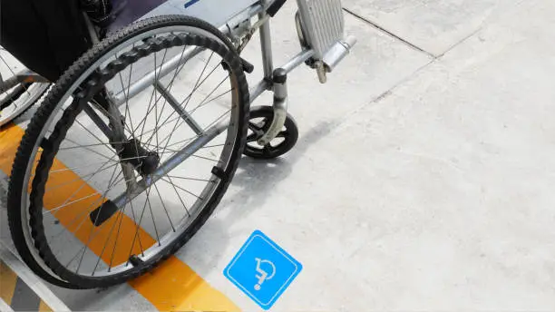 Photo of close up wheel chair diable equipment install at service point in hospital